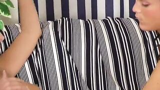 Sexy teen lesbians experiment with each other, a vibrator on the sofa - 1 image
