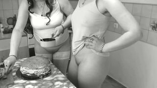 Konstanzia, the stunning brunette MILF, makes a cake for women's day with her perfect ass and huge natural tits in her short