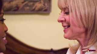 Lotus Lain and Nina Hartley get down and dirty with some raw pussy licking and kissing action - 1 image